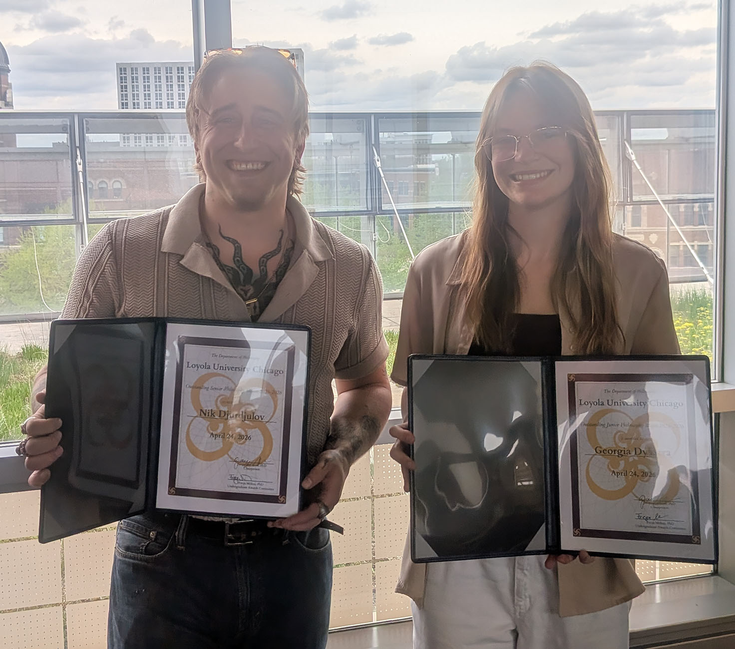 2026 Outstanding Junior and Senior Philosophy Majors pose with their certificates